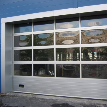 Алютех секционные ворота белого цвета 2625x2875